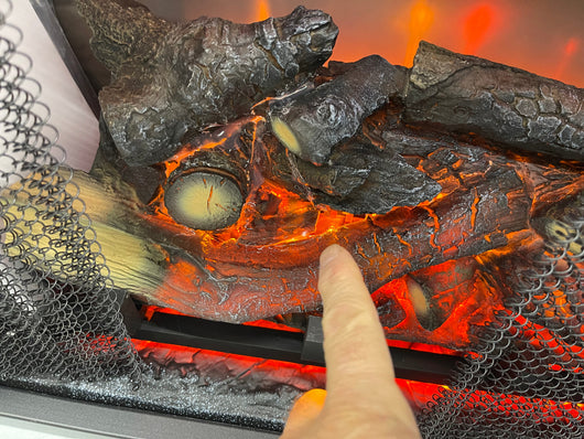 32” wide electric fireplace insert   brand new - but Salvage - log set was damaged in shipping- does not affect operation at all  includes multifunction remote control