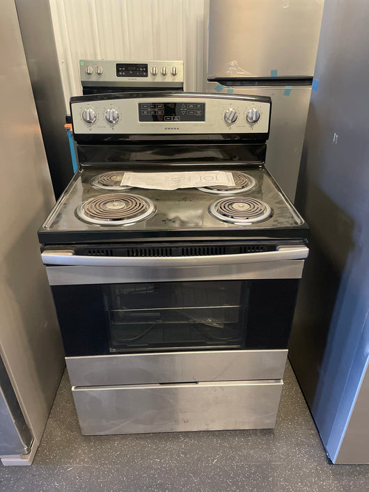 Amana stove 30-in 4 Elements 4.8-cu ft Freestanding Electric Range (Stainless Steel) brand new - not a return - scratch and dent unit- minor shipping damages