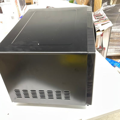 Magic Chef 1.6 cu. ft. Countertop Microwave in Stainless steel with Gray inside!! NEW OUT OF THE BOX, loose feet, TESTED WORKS GREAT!!