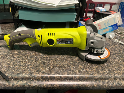 RYOBI 7.5 Amp 4.5 in. Corded Angle Grinder!! VERY LIGHTLY USED, USED ONCE(TESTED WORKS GREAT)!!