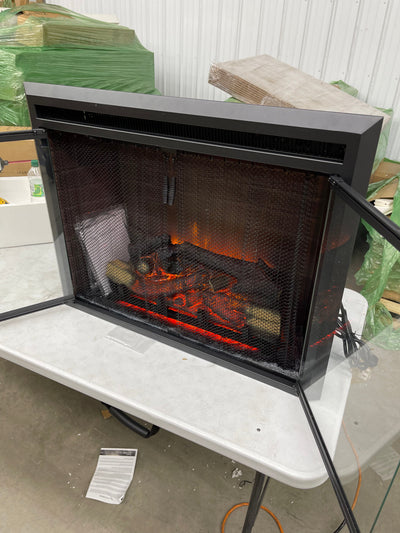 32” wide electric fireplace insert   brand new - but Salvage - log set was damaged in shipping- does not affect operation at all  includes multifunction remote control