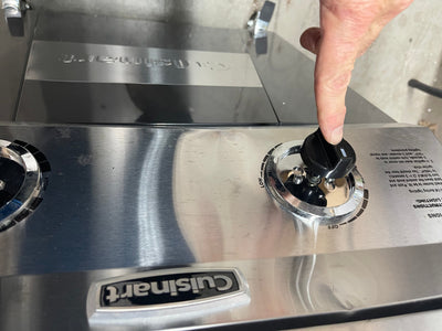The Big Catch proudly presents -   FRANKENGRILL !  it’s a brand new Cuisinart 2 burner stainless steel grill with pathetic little universal burner knobs that we installed since the original ones were missing